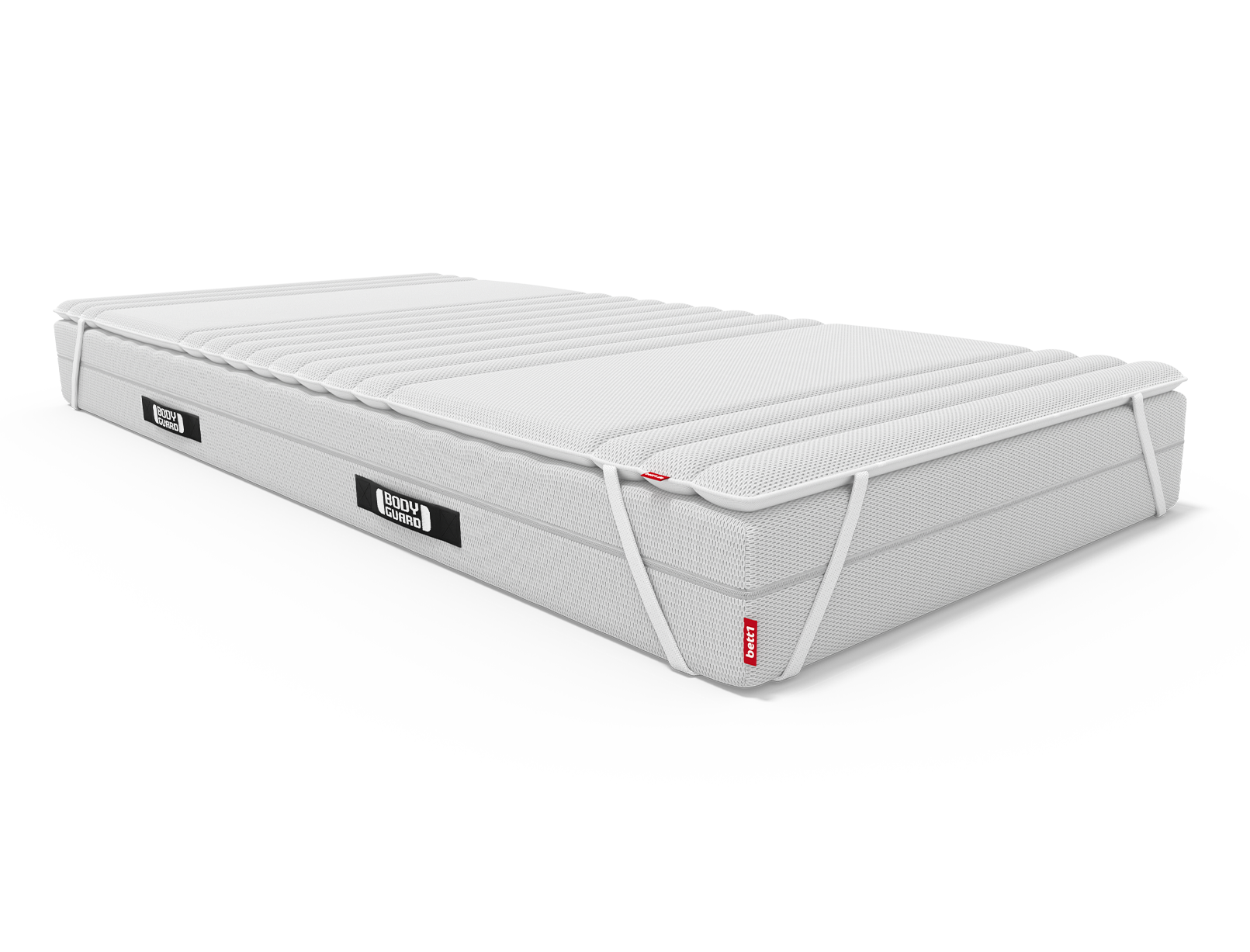 The topper lies on the BODYGUARD® mattress and is attached to it with the retaining straps.	
