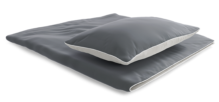 A pillow lies on a duvet folded in the middle. The duvet and pillow are covered with BODYGUARD satin bed linen.