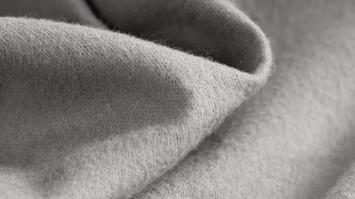 Photo: Close-up view of the roughened structure of a fitted sheet for winter.