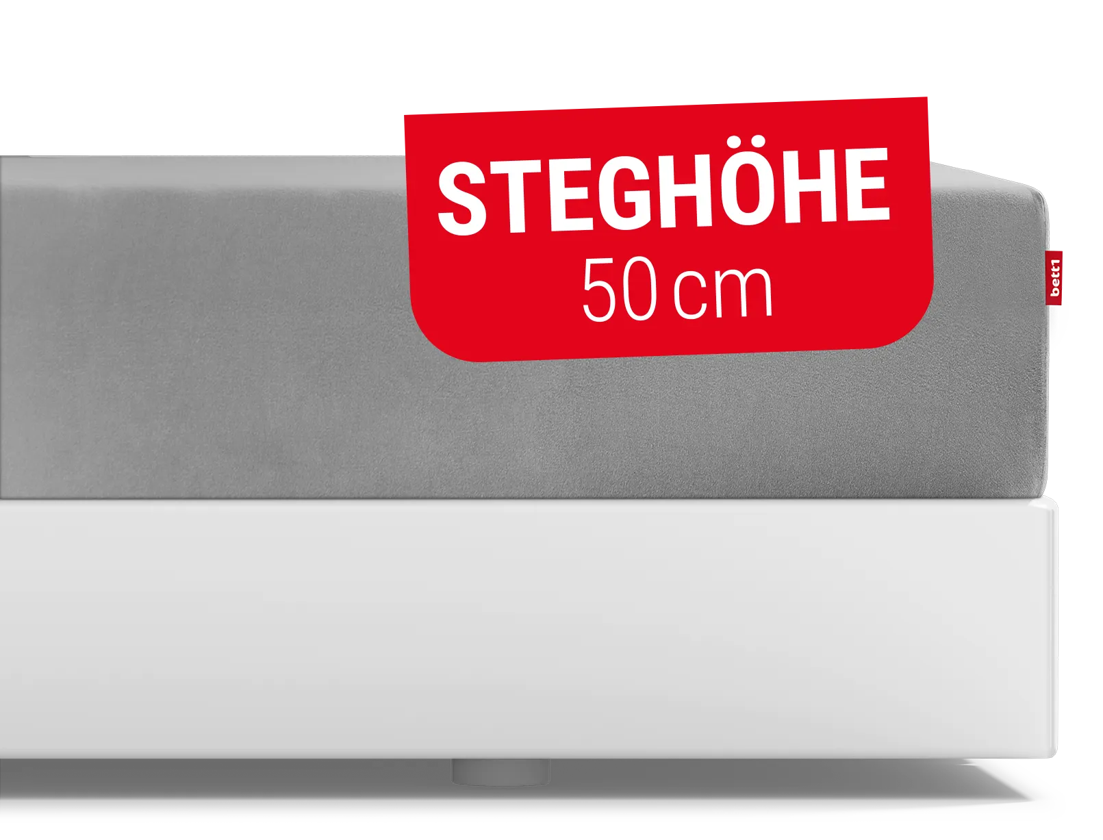Das BODYGUARD® Spannbettlaken extra hoch aufgezogen auf der BODYGUARD® Boxspring Matratze. Text: Steghöhe 50cm	