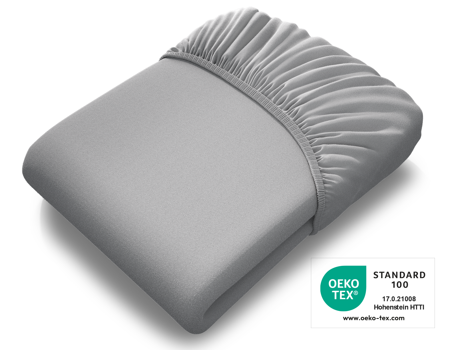  The BODYGUARD® fitted sheet folded up extra high, with the Oeko-Tex® Standard 100 seal on top	