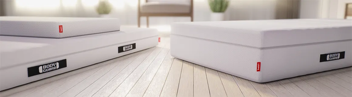 Illustration: The BODYGUARD® Mattress in the sizes 80x190 cm, 90x200 cm, 140x220 cm, 160x210 cm and 200x200 cm. Left a figure with the size indication: 153 cm. Right a figure with the size specification 171 cm and a figure with the specification 180 cm.	