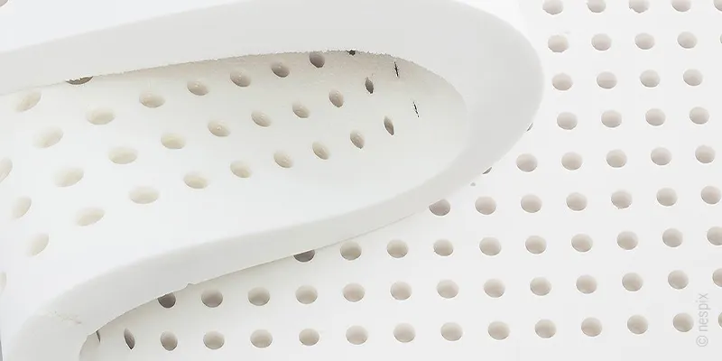 Close-up of a 80x200 cm latex topper with ventilation channels