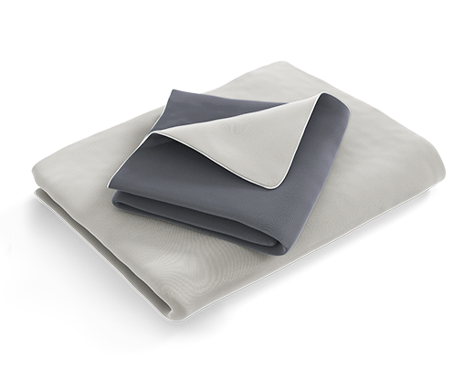 The folded SOFT BREEZE® Satin Bed Linen: the duvet cover is folded with the silver side facing outwards, the pillowcase with the anthracite-coloured side	