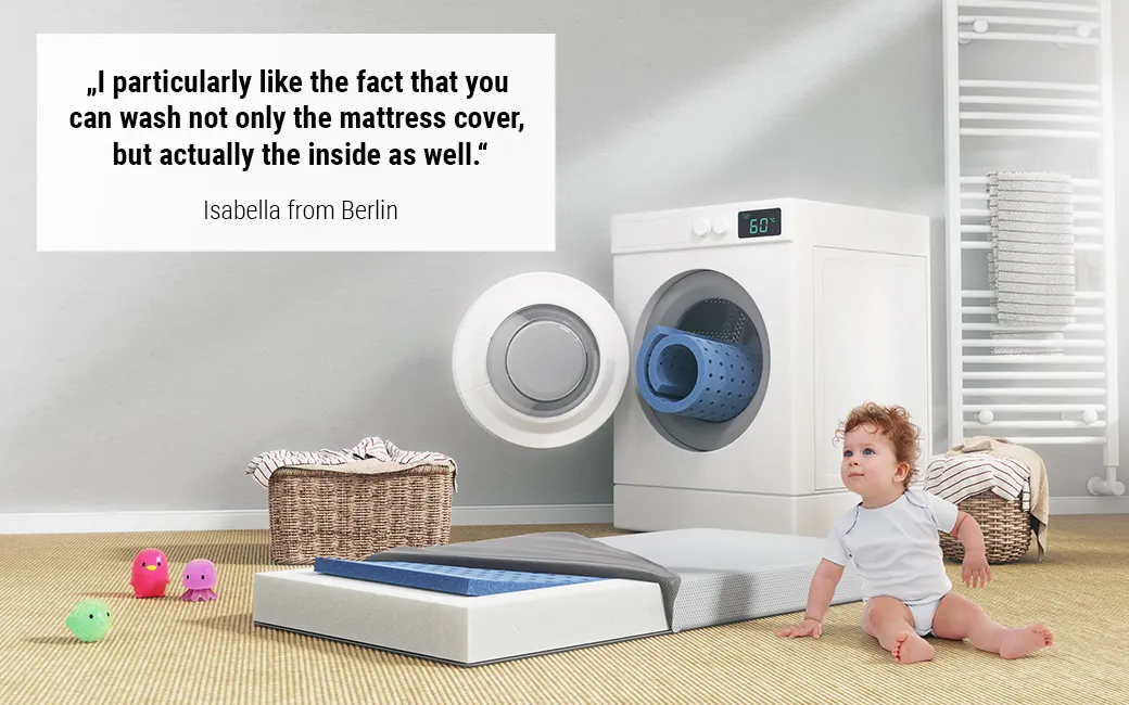 BODYGUARD® Kids Mattress in front of a washing machine. A child sits in front of the mattress. Text: "I particularly like the fact that you can wash not only the mattress cover, but also the inside." Isabella from Berlin	