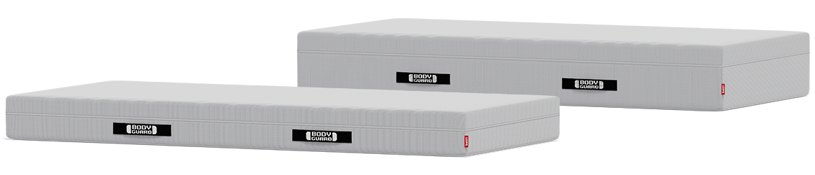 Eine BODYGUARD Anti-Kartell-Matratze liegt vor der extra hohen BODYGUARD Boxspring Matratze