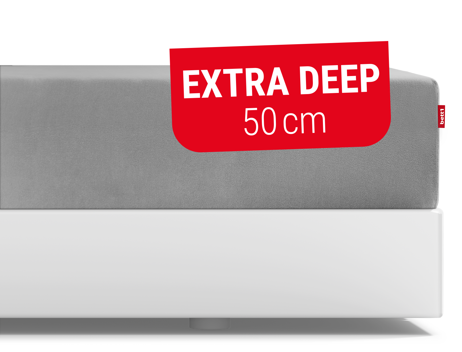  The BODYGUARD® fitted sheet pulled up extra high on the BODYGUARD® Boxspring mattress.Text: Height 50cm	
