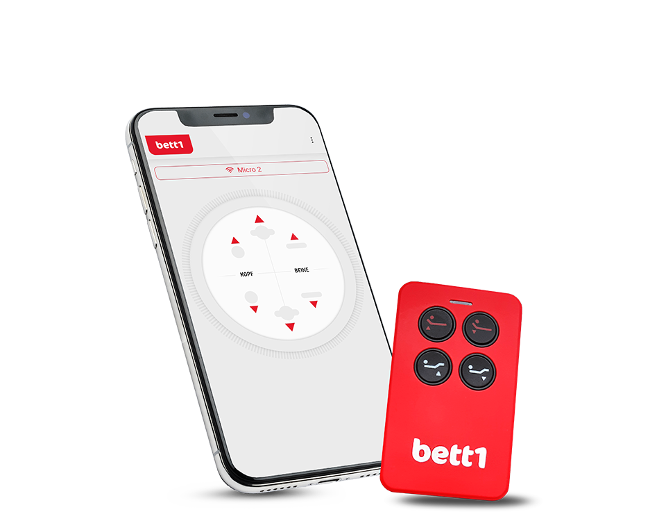 The remote control for the HULK Mattress. Behind it is a smartphone with the HULK app open.