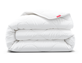 The BODYGUARD Summer Duvet light, neatly folded.