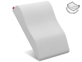 BODYGUARD® Leg Elevation Pillow placed upright and balanced on its thin side. Next to it is the illustration of the cushion cover in three layers with the text: ergonomic and innovative
