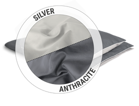 The SOFT BREEZE® Satin Bed Linen: one half of a cut-out shows the silver side of the Satin fabric, the other the anthracite-coloured side. Text: Silver/anthracite	