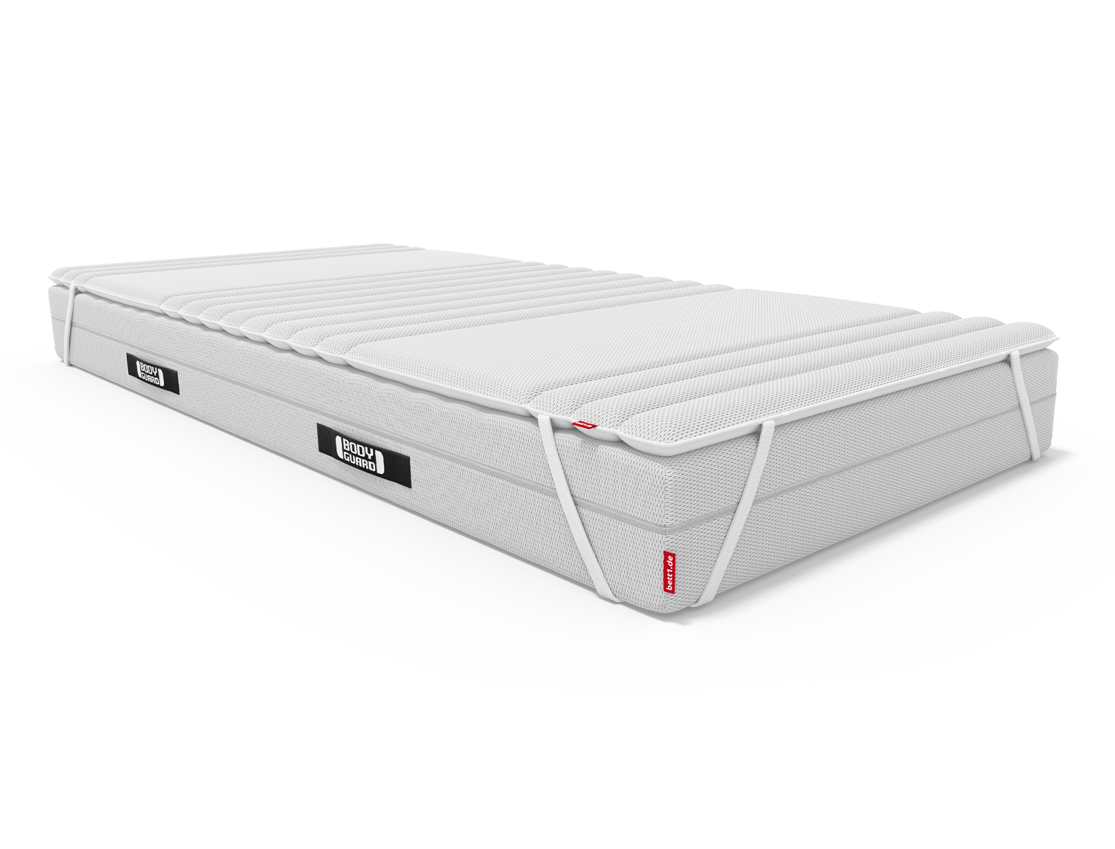 The topper lies on the BODYGUARD® mattress and is attached to it with the retaining straps.	
