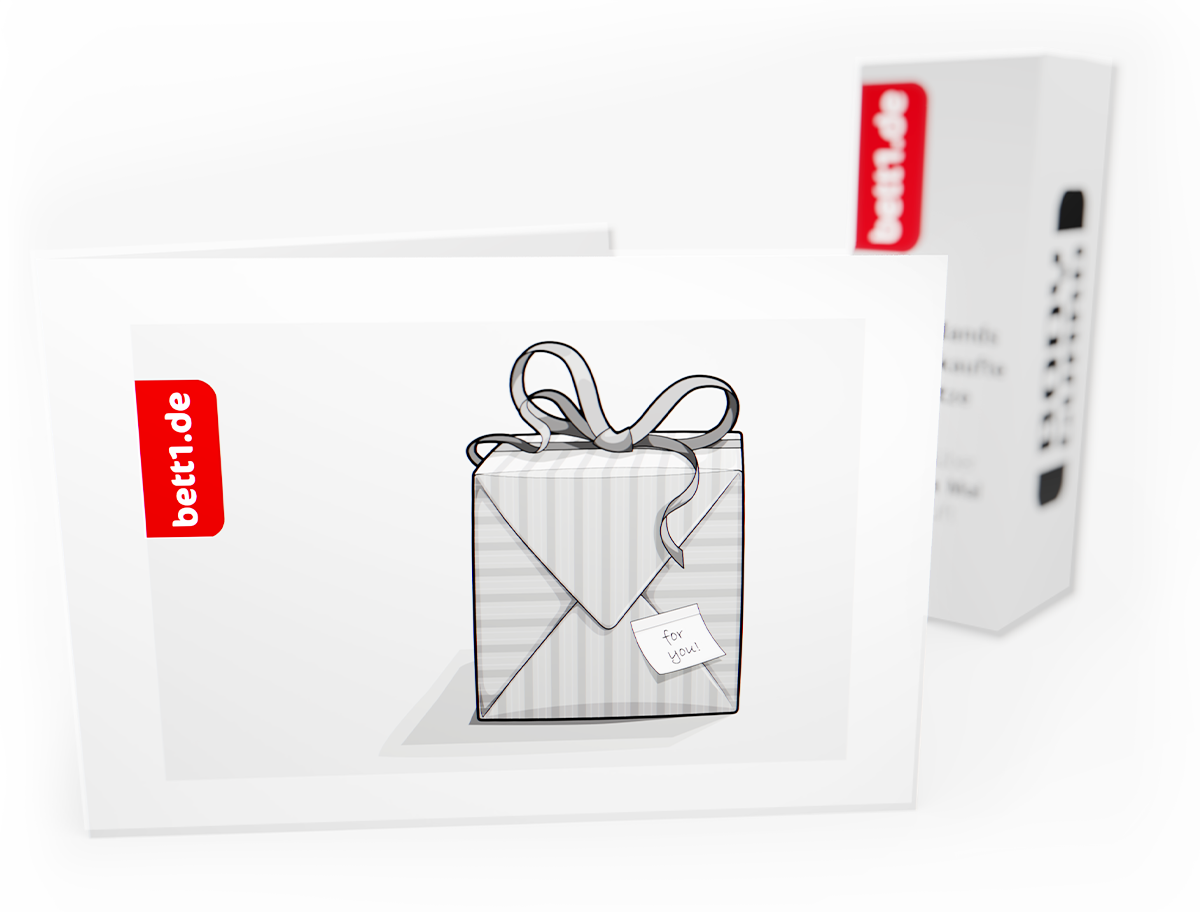 The bett1.de gift voucher with gift pack motif stands slightly opened in front of a mattress box.