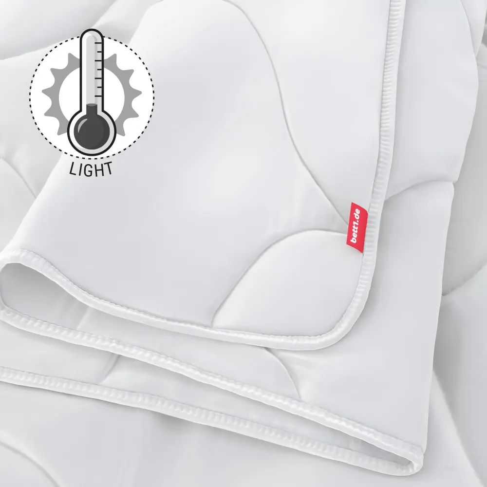 The folded BODYGUARD Summer Duvet light. Illustration of a thermometer showing a low temperature. Text: light