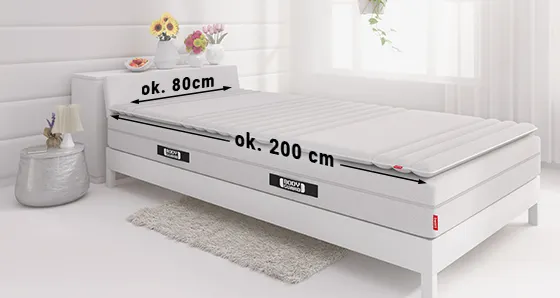 An 80x200 cm mattress lies on a bed. The dimensions are shown on each side.
