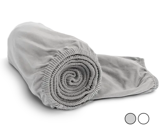The folded BODYGUARD jersey fitted sheet in white: Zoom on the sheet in the silver colour version. Text: Available in silver or white