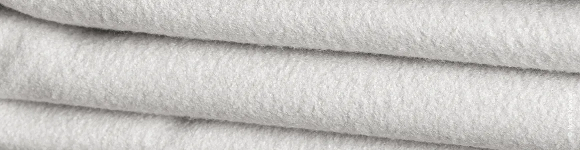 Folded microfibre sheets