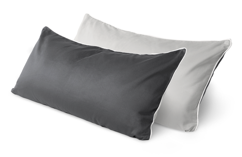 Two narrow cushions 80x40cm, covered with the Satin Bed Linen. The dark, anthracite-coloured side of the front one is visible, the light, silver side of the back one.