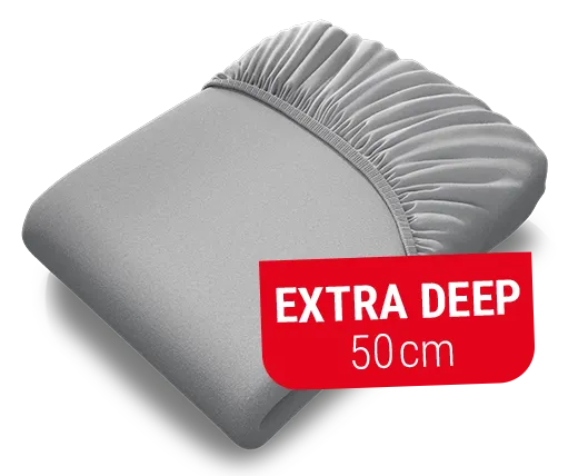  The BODYGUARD® fitted sheet pulled up extra high on the BODYGUARD® Boxspring mattress.Text: Height 50cm	