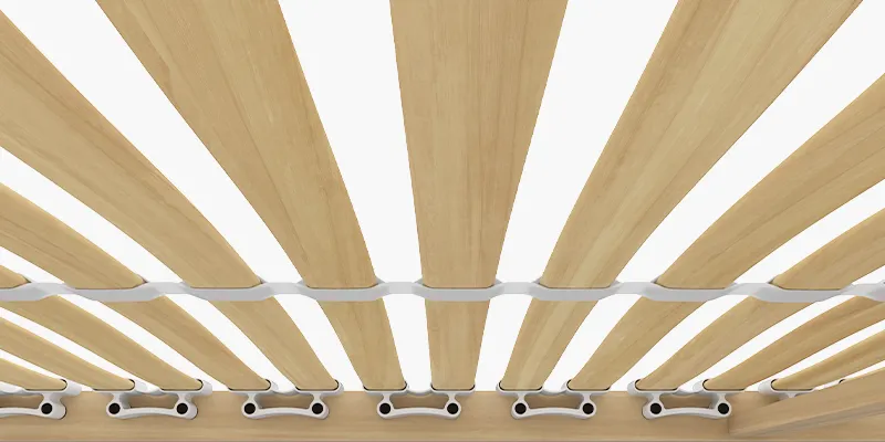 Close-up of the underside of the BODYGUARD Slatted Frame Basic. The narrow gaps between the sprung slats are clearly visible