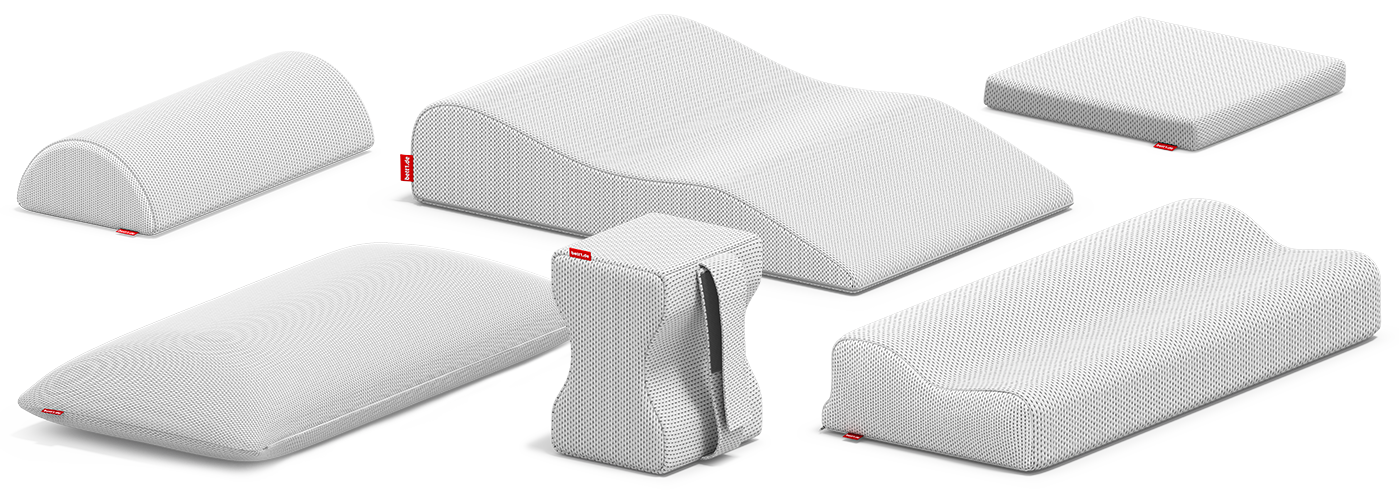 A compilation of the BODYGUARD pillows from bett1: Ergonomic Pillow, Memory Foam Pillow, Knee Pillow, Bolster, Leg Elevation Pillow and Seat Cushion.