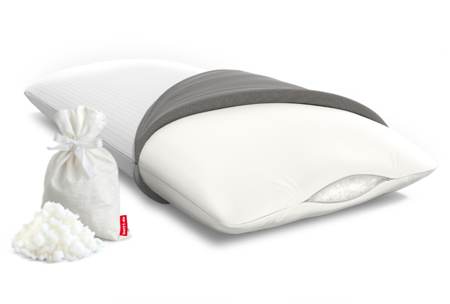The BODYGUARD Memory Foam Pillow with open cover and view inside the pillow, a small bag and a pile of foam flakes