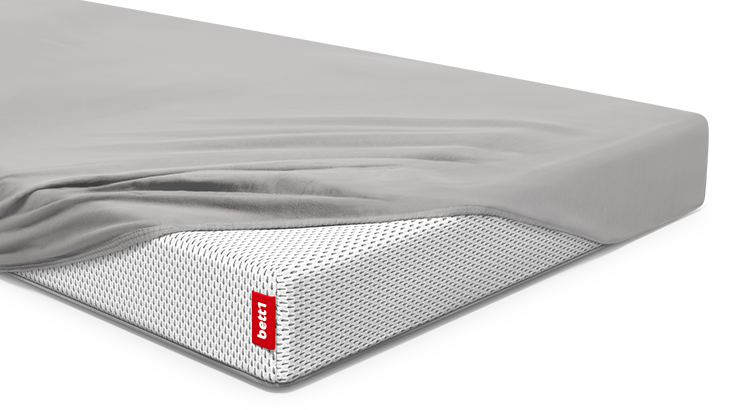 SuperBreeze Kids Mattress with a BODYGUARD Fitted Sheet 70x140 cm partially fitted.