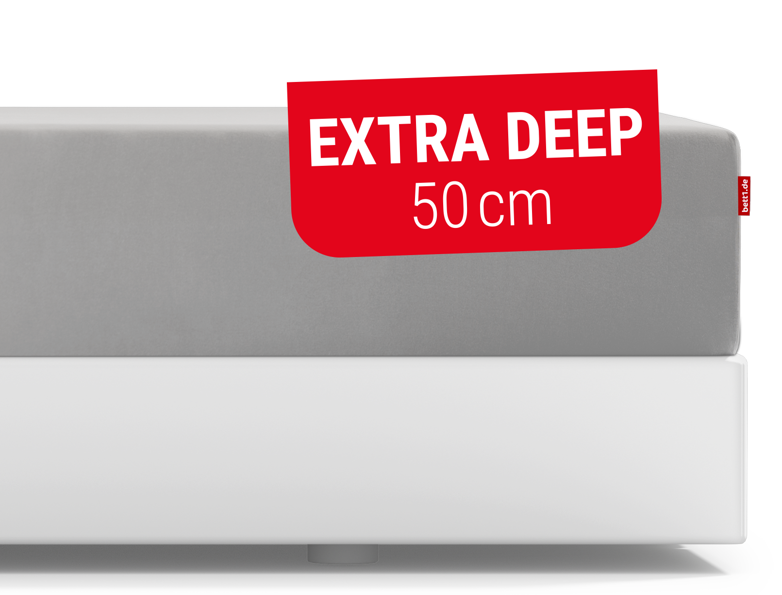  The BODYGUARD® fitted sheet pulled up extra high on the BODYGUARD® Boxspring mattress.Text: Height 50cm	