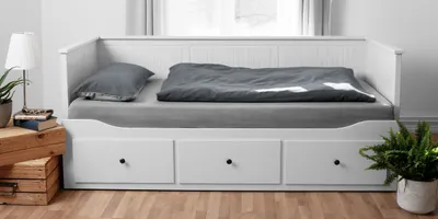 Photo: A sofa bed with drawers, covered with BODYGGUARD bed linen 135x200 cm and sheets.