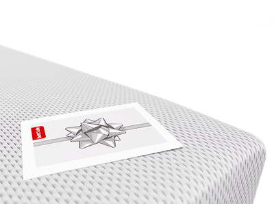 Der bett1.de Geschenkgutschein mit einer Schleife als Motiv liegt auf einer Matratze.c	